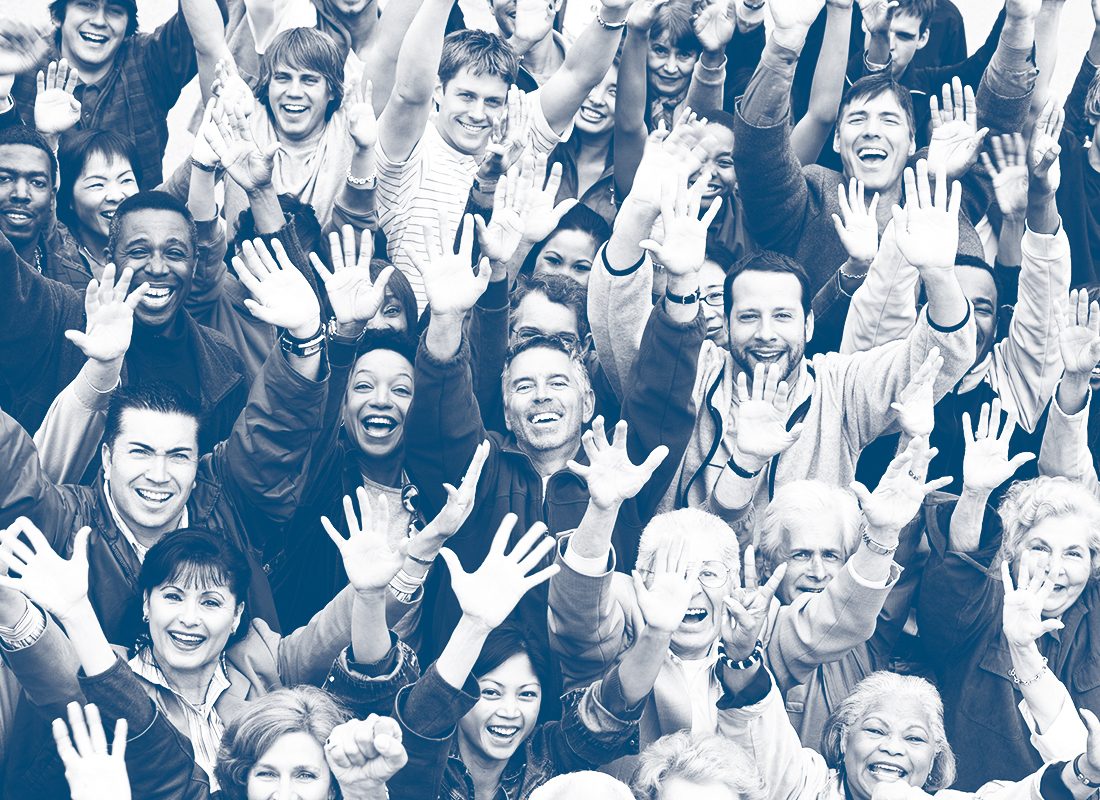 High angle view of group of happy multiethnic people raising hands together